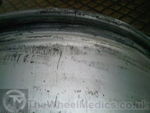 004. Alloy Wheel is Cracked along bead line causing air lose